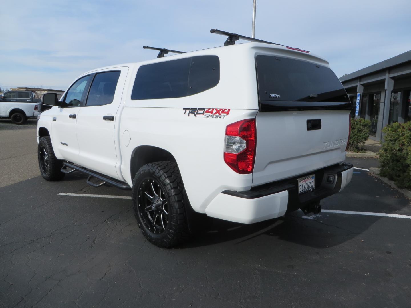 2019 White /BLACK Toyota Tundra SR5 5.7L V8 CrewMax 4WD (5TFDY5F19KX) with an 5.7L V8 DOHC 32V engine, 6A transmission, located at 2630 Grass Valley Highway, Auburn, CA, 95603, (530) 508-5100, 38.937893, -121.095482 - Clean leveled Tundra with 20" Fuel Maverick wheels, Nitto Ridge Grappler tires, N-Fab running boards, Snug Top camper shell with Yakima racks. - Photo#6